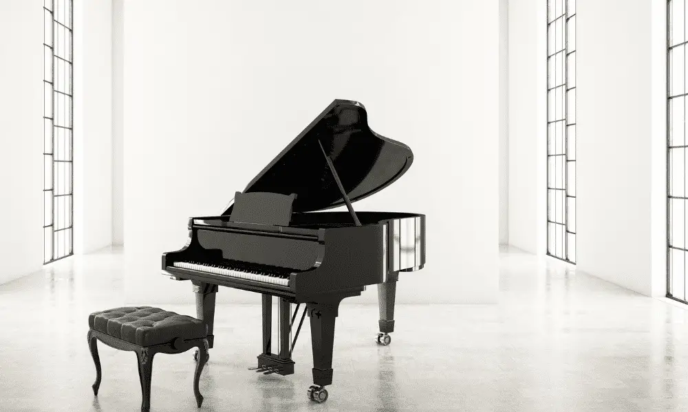 Baby grand piano in large room